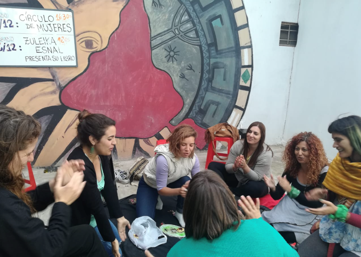 “Women’s Circle at the Community Library of Matheu ” by Viviana Suárez is licensed under CC BY 4.0