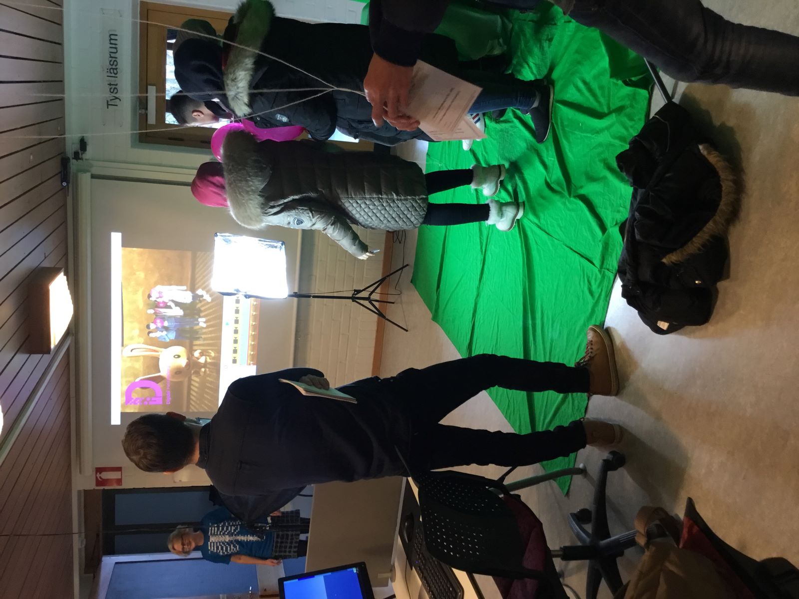 “Visitors at a workshop with green screen ” by Helsingborg Public Library is licensed under CC BY 4.0