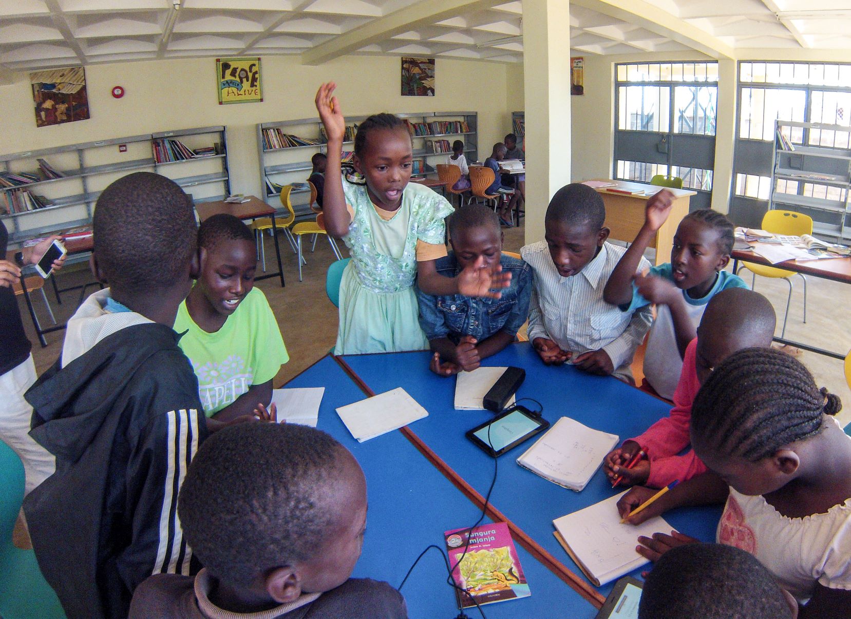“Children participating in educational activity in the library ” by EIFL is licensed under CC BY 4.0